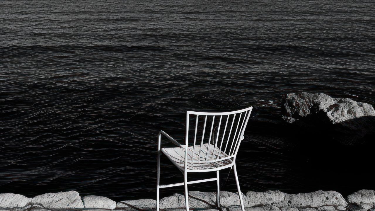 Photography of silence ocean monochrome furniture outdoors. Black and white aesthetic *Photography of silence ocean* front view, aesthetic vibe, extreme contrast, in style of dark black and white color, minimal, simple, emotional, neat position, clean --ar 9:16 --c 10